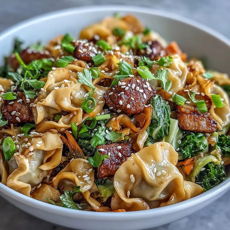 Served with lime wedges and sesame seeds, this Asian fusion bowl showcases colorful bean sprouts and herbs for a vibrant, dairy-free family meal.
